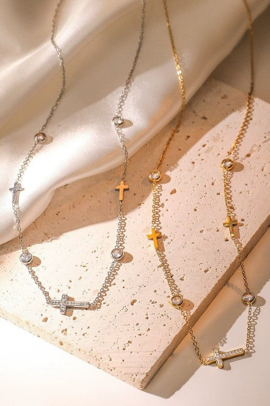 Gold and silver rhinestone cross station necklace comparison