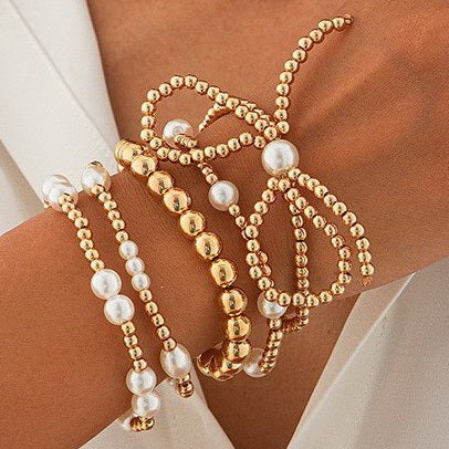 Asha Multi Layer Ball Chain Bead Pearl Bow Bracelet worn on wrist
