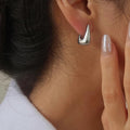 Brinly Silver geometric hoop earring