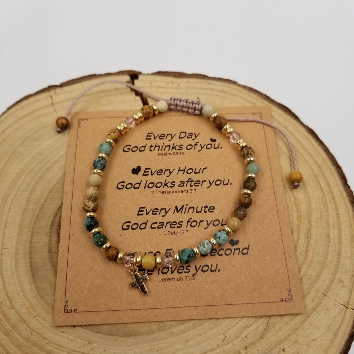 Nova Cross Mini Natural Stone Bead Bracelet Brown with Blessing Card on wood display