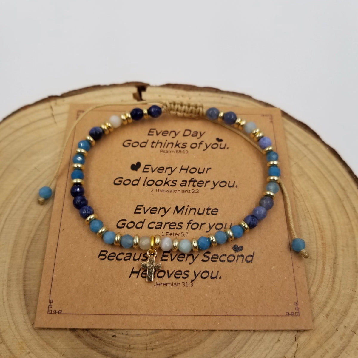 Nova Cross Mini Natural Stone Bead Bracelet Blue with Blessing Card on wood display