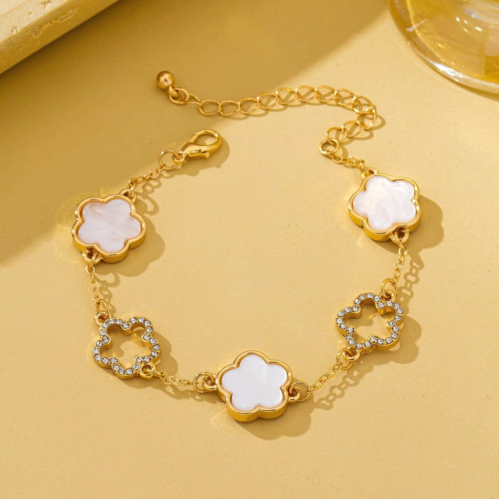 Iris Four Leaf Enamel Charm Bracelet in white on yellow background