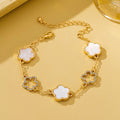 Iris Four Leaf Enamel Charm Bracelet in white on yellow background