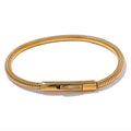 Willow Cord Bangle Bracelet in 18K gold on white background